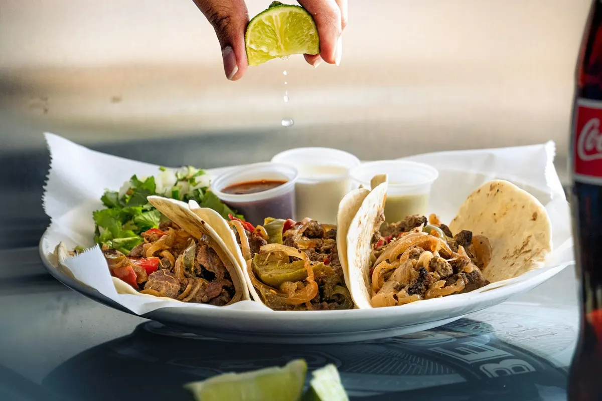 Fresh tacos with cilantro and a squeeze of lime
